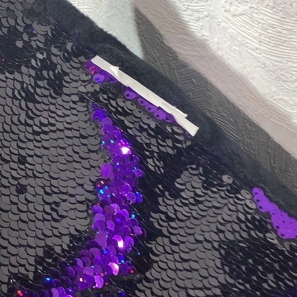 Reversible Sequins Pillow with black plush backside metallic purple & black